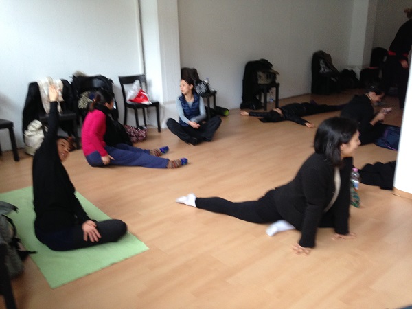 Dancers warming up prior the audition.